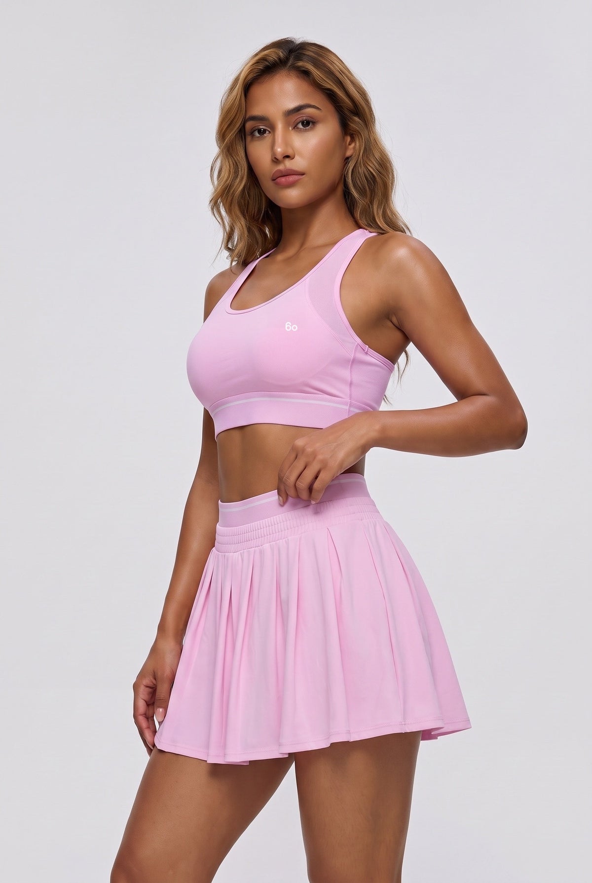 TESSA striped tank & pleated skirt set in Pink diamond – women's padel set by Six'o – studio photo