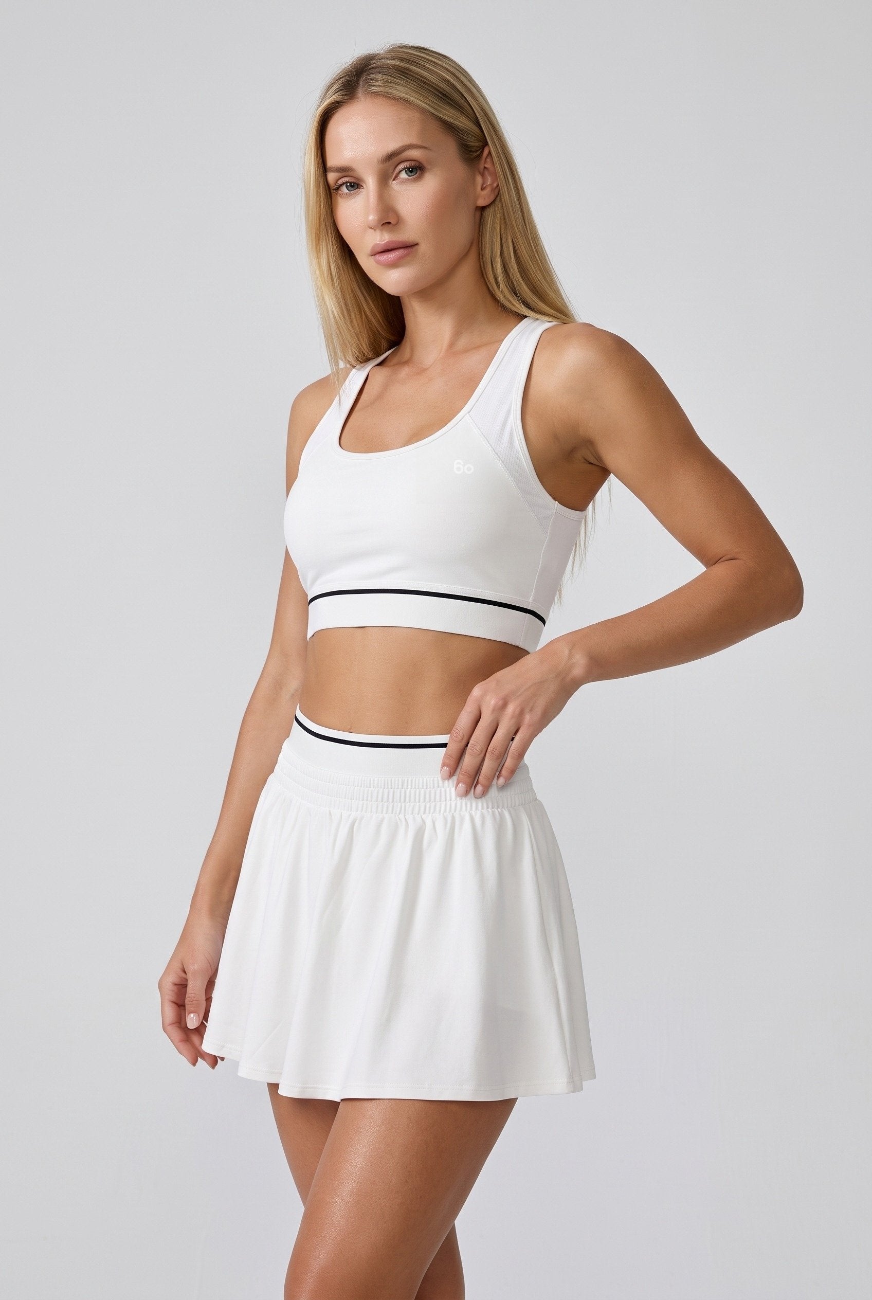 TESSA striped tank & pleated skirt set in White – women's padel set by Six'o – studio photo
