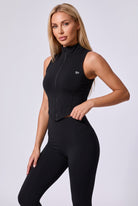ZARA zip vest & leggings set in Black – women's padel set by Six'o – studio photo