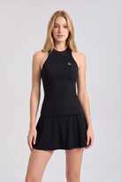 ZOE high neck padel dress in Black – women's padel dress by Six'o – front view