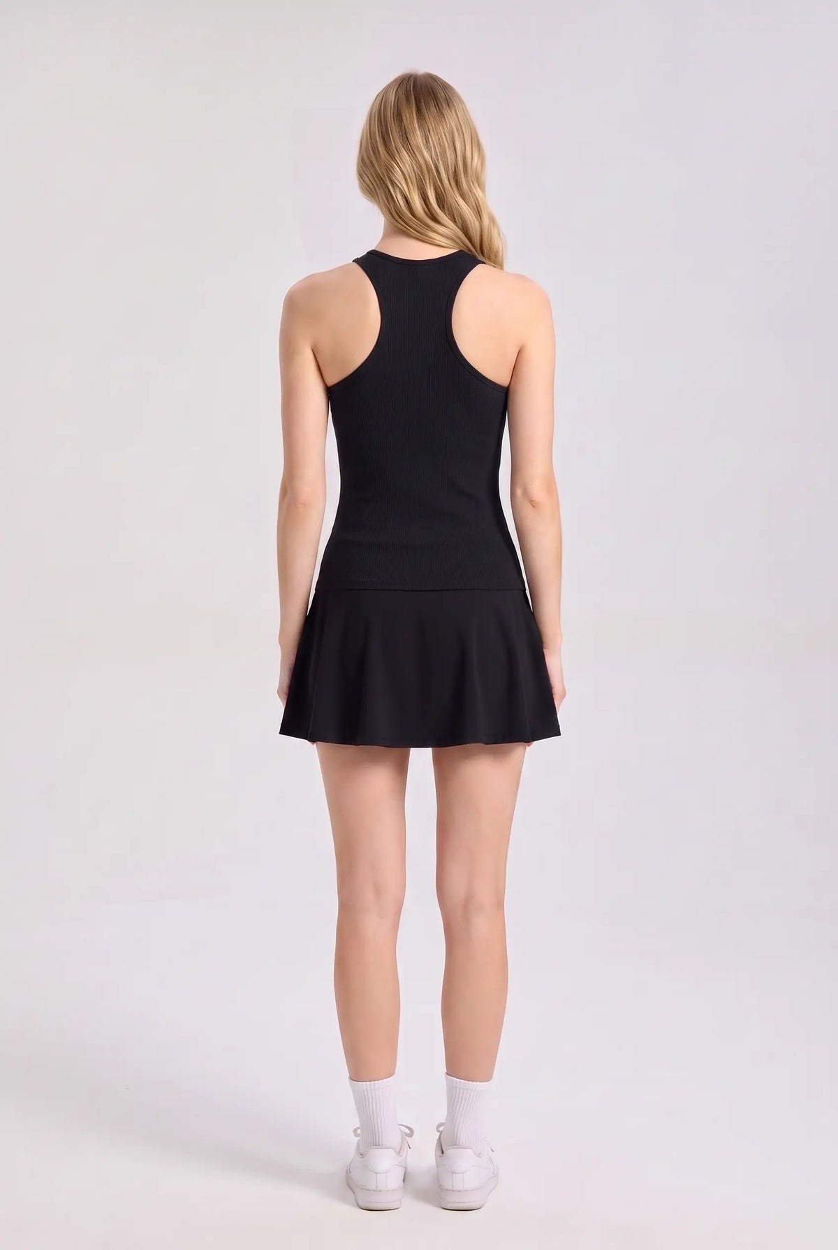 ZOE high neck padel dress in Black – women's padel dress by Six'o – back view