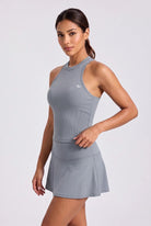ZOE high neck padel dress in Pewter grey – women's padel dress by Six'o – studio photo